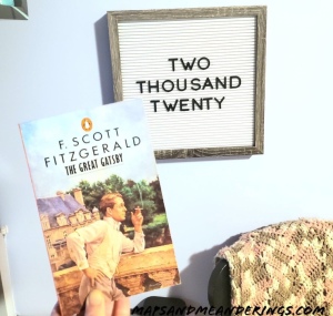 The Great Gatsby book in front of Letterboard