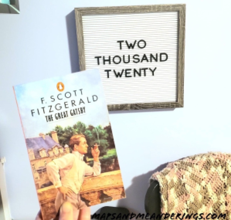 The Great Gatsby book in front of Letterboard