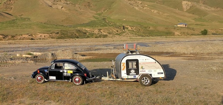 VW Bug pulling a small trailer